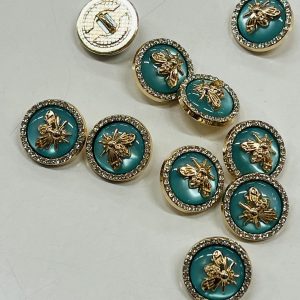 Auksinė sagutė „Musė žydram perle”, puošta akutėm, 18mm, 1vnt 02731