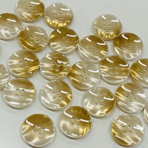 Gelsvai šampaninė perlamutrinė plastikinė saga, 25mm, 1vnt 02790