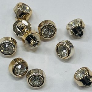 Plastikinė sagutė „Akutė auksiniam rėmely”, 9mm, 1vnt 018291