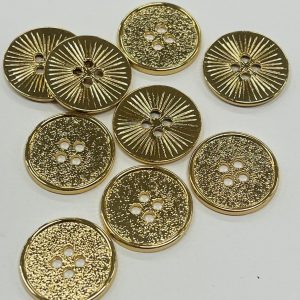 Auksinė, metalinė saga, šlifuota, 4 skylučių, 22mm, 1vnt 03157