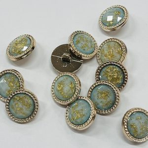 Auksinė, plastikinė saga melsvu viduriuku, apipinta grandinėle, 21mm1vnt 01302