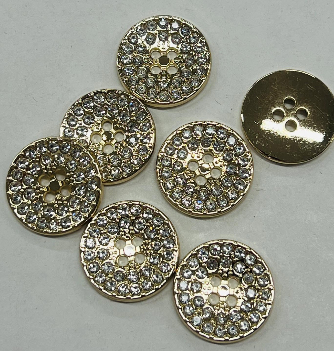 Auksinė, metalinė saga, iš akučių, 4 skylučių, 20mm, 1vnt 03552